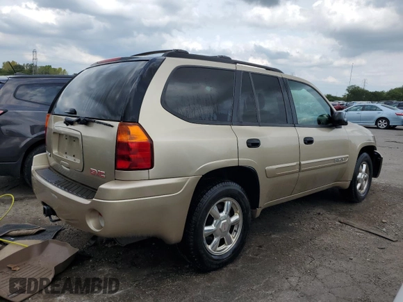 2004 GMC Envoy SLT with VIN 1GKDT13S142425057, listed as a Copart auction lot 69037524 with 231,483 mi miles and Salvage Title. Bid and sale history available at carsss.com. Image 3.