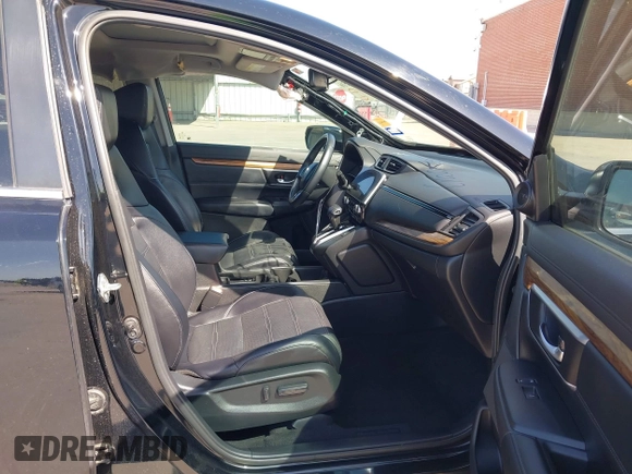 2018 Honda CR-V Touring with VIN 2HKRW2H91JH630702, listed as a IAAI auction lot 41983516 with 84,355 mi miles. Bid and sale history available at carsss.com. Image 5.