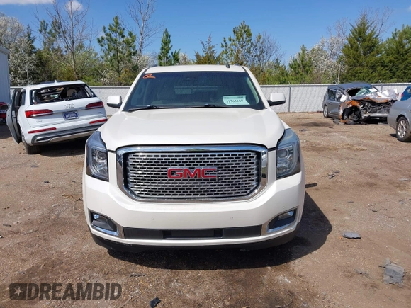 2015 GMC Yukon Denali with VIN 1GKS1CKJ5FR285199, listed as a IAAI auction lot 41763187 with 135,265 mi miles. Bid and sale history available at carsss.com. Image 12.