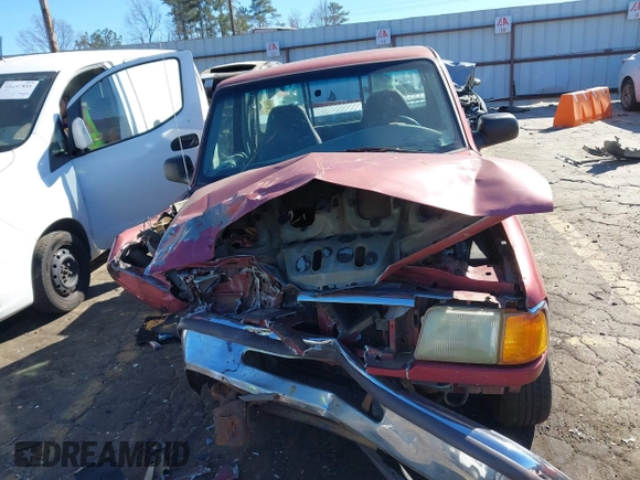 1997 Ford Ranger XLT with VIN 1FTCR10A5VTA45443, listed as a IAAI auction lot 41696416 with 323,855 mi miles. Bid and sale history available at carsss.com. Image 6.