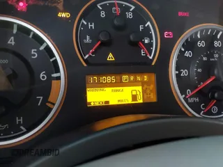2013 Nissan Titan PRO-4X with VIN 1N6BA0EC9DN301669, listed as a IAAI auction lot 41868397 with 171,085 mi miles. Bid and sale history available at carsss.com. Image 7.