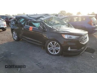 2020 Ford Edge SEL с VIN 2FMPK4J90LBB57040, выставлен на аукционе Copart как лот 62237005 с пробегом Не указан миль и Списание • Salvage title. История ставок и продаж доступна на DreamBid. Изображение 4.