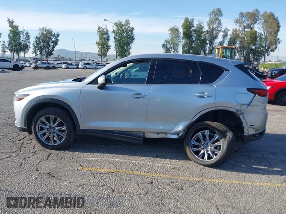2021 Mazda CX-5 Grand Touring with VIN JM3KFADM1M1393251, listed as a IAAI auction lot 42072862 with 47,758 mi miles. Bid and sale history available at carsss.com. Image 14.