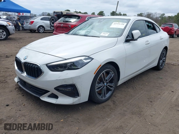 2021 BMW 2 Series 228i xDrive with VIN WBA73AK06M7G59514, listed as a IAAI auction lot 41951326 with 76,064 mi miles and . Bid and sale history available at DreamBid. Image 2.