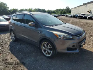 2013 Ford Escape Titanium with VIN 1FMCU9J90DUD21906, listed as a Copart auction lot 63049485 with 201,496 mi miles and Clean title. Bid and sale history available at DreamBid. Image 4.