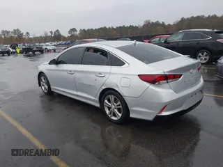 2018 Hyundai Sonata SEL with VIN 5NPE34AF0JH696872, listed as a IAAI auction lot 41070305 with 121,000 mi miles and . Bid and sale history available at DreamBid. Image 3.