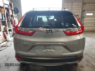 2017 Honda CR-V Touring with VIN 5J6RW2H95HL042012, listed as a IAAI auction lot 41911028 with 93,575 mi miles. Bid and sale history available at carsss.com. Image 17.