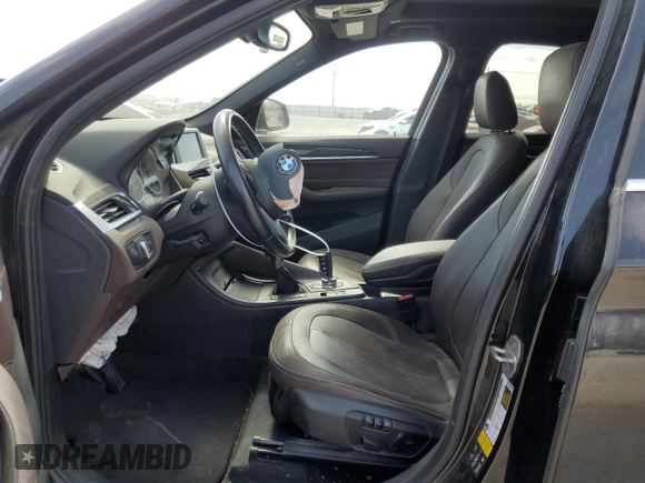 2017 BMW X1 xDrive28i with VIN WBXHT3Z31H4A57021, listed as a Copart auction lot 46507885 with 165,071 mi miles and Salvage Title. Bid and sale history available at carsss.com. Image 7.