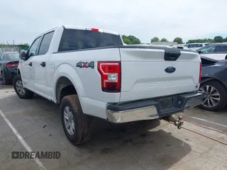 2019 Ford F-150 XL with VIN 1FTEW1E53KFD17091, listed as a IAAI auction lot 42320554 with 166,961 mi miles and . Bid and sale history available at DreamBid. Image 14.