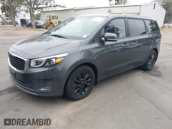 2016 Kia Sedona LX with VIN KNDMB5C11G6200986, listed as a IAAI auction lot 42047368 with 121,376 mi miles. Bid and sale history available at carsss.com. Image 2.