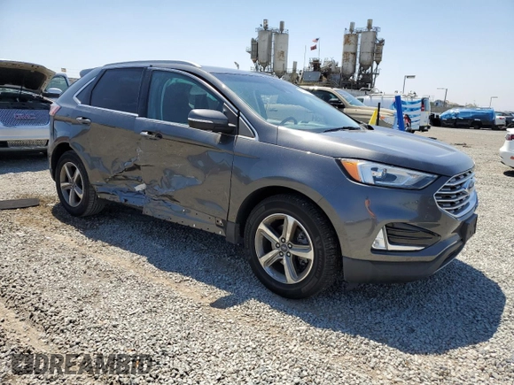 2020 Ford Edge SEL с VIN 2FMPK3J97LBA48892, выставлен на аукционе Copart как лот 58008145 с пробегом 52 588 миль миль и Списание • Salvage title. История ставок и продаж доступна на DreamBid. Изображение 4.