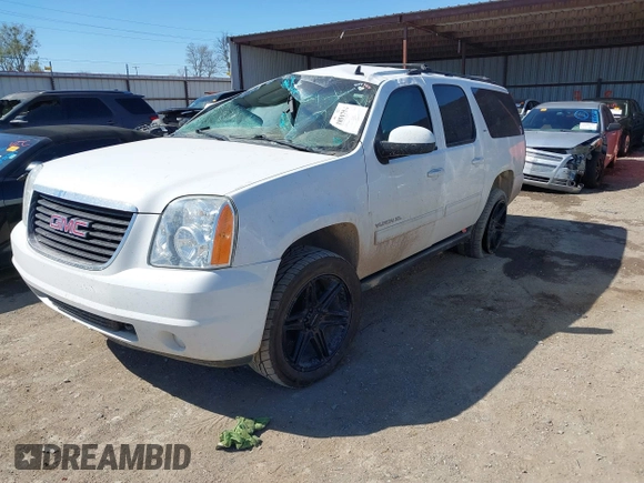 2013 GMC Yukon XL SLT z VIN 1GKS2KE77DR326758, wystawiony jako IAAI lot #41851754 z przebiegiem 144 976 mil mil oraz . Historia ofert i sprzedaży dostępna na DreamBid. Obrazek 17.