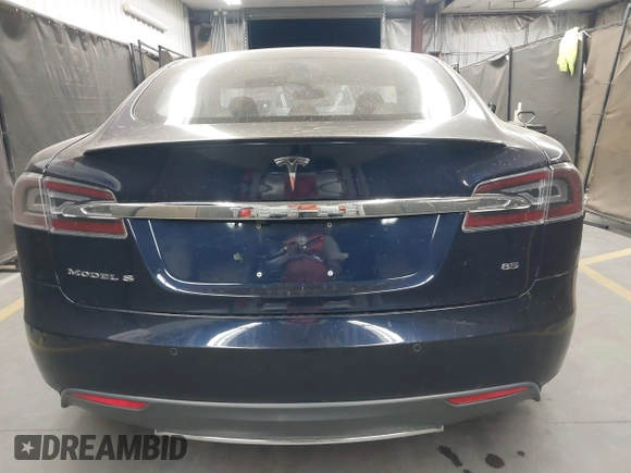 2014 Tesla Model S 60 with VIN 5YJSA1H11EFP56406, listed as a IAAI auction lot 42065157 with Not Provided miles and . Bid and sale history available at DreamBid. Image 16.