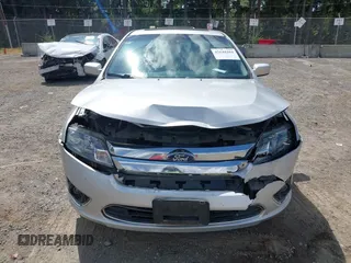 2012 Ford Fusion Hybrid with VIN 3FADP0L35CR440051, listed as a IAAI auction lot 42644284 with 89,087 mi miles and . Bid and sale history available at DreamBid. Image 6.