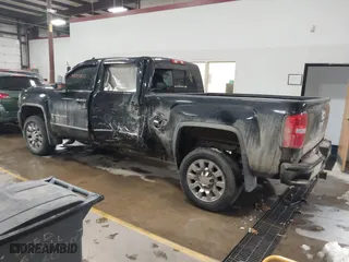 2017 GMC Sierra 2500HD Denali with VIN 1GT12UEY1HF212175, listed as a IAAI auction lot 40998857 with 80,297 mi miles. Bid and sale history available at carsss.com. Image 3.
