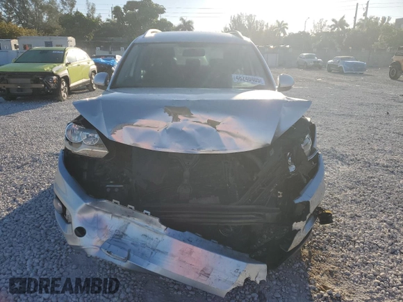 2014 Volkswagen Tiguan SE z VIN WVGAV3AX6EW549608, wystawiony jako Copart lot #48240405 z przebiegiem 81 629 mil mil oraz Szkoda całkowita • Salvage title. Historia ofert i sprzedaży dostępna na DreamBid. Obrazek 5.