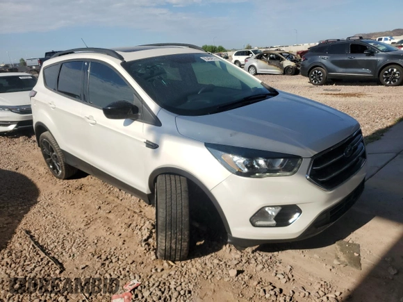 2017 Ford Escape SE z VIN 1FMCU9G97HUC26806, wystawiony jako Copart lot #65464674 z przebiegiem 93 023 mil mil oraz Szkoda całkowita • Salvage title. Historia ofert i sprzedaży dostępna na DreamBid. Obrazek 4.