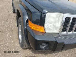 2007 Jeep Commander Sport with VIN 1J8HG48K17C651084, listed as a IAAI auction lot 42064395 with 212,057 mi miles. Bid and sale history available at carsss.com. Image 6.