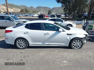 2015 Kia Optima LX with VIN KNAGM4A72F5616233, listed as a IAAI auction lot 41824232 with 163,006 mi miles. Bid and sale history available at carsss.com. Image 13.
