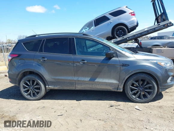 2017 Ford Escape SE with VIN 1FMCU0G92HUF10596, listed as a IAAI auction lot 42038215 with 145,735 mi miles. Bid and sale history available at carsss.com. Image 13.