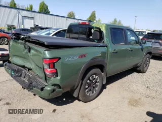 2023 Nissan Frontier Pro-4X z VIN 1N6ED1EK1PN660195, wystawiony jako Copart lot #54216795 z przebiegiem 18 556 mil mil oraz Szkoda całkowita • Salvage title. Historia ofert i sprzedaży dostępna na DreamBid. Obrazek 3.