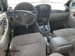 2004 Suzuki XL7 LX with VIN JS3TX92V444107106, listed as a Copart auction lot 62322035 with 94,380 mi miles and Salvage title. Bid and sale history available at DreamBid. Image 8.