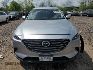 2016 Mazda CX-9 Touring z VIN JM3TCBCY0G0120898, wystawiony jako Copart lot #53628085 z przebiegiem 108 066 mil mil oraz Szkoda całkowita • Salvage title. Historia ofert i sprzedaży dostępna na DreamBid. Obrazek 5.