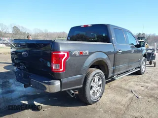 2015 Ford F-150 XLT with VIN 1FTEW1EG6FKF22211, listed as a IAAI auction lot 41753438 with 130,019 mi miles. Bid and sale history available at carsss.com. Image 4.