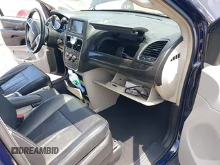 2015 Chrysler Town & Country LX with VIN 2C4RC1AG6FR677570, listed as a IAAI auction lot 39881299 with 154,328 mi miles and . Bid and sale history available at carsss.com. Image 5.