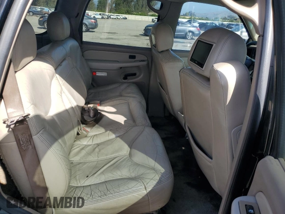 2001 GMC Yukon SLT z VIN 1GKEC13TX1J134930, wystawiony jako Copart lot #56724775 z przebiegiem 226 576 mil mil oraz Szkoda całkowita • Salvage title. Historia ofert i sprzedaży dostępna na DreamBid. Obrazek 11.