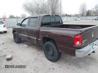 2005 Dodge Dakota SLT with VIN 1D7HW48N95S298672, listed as a IAAI auction lot 41765025 with 291,447 mi miles. Bid and sale history available at carsss.com. Image 3.