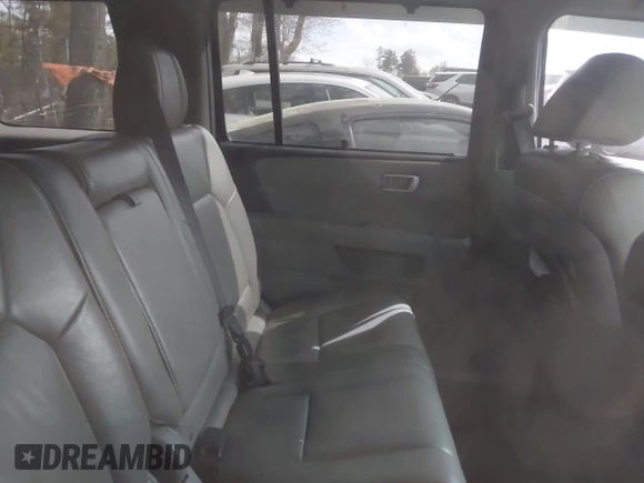 2012 Honda Pilot Touring with VIN 5FNYF4H92CB051260, listed as a IAAI auction lot 41906802 with 256,691 mi miles. Bid and sale history available at carsss.com. Image 8.
