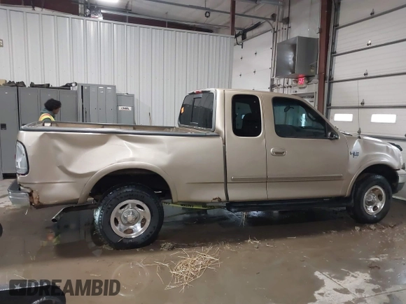 1999 Ford F-150 with VIN 1FTRX18W0XKA68363, listed as a IAAI auction lot 41524104 with 218,400 mi miles and . Bid and sale history available at DreamBid. Image 14.