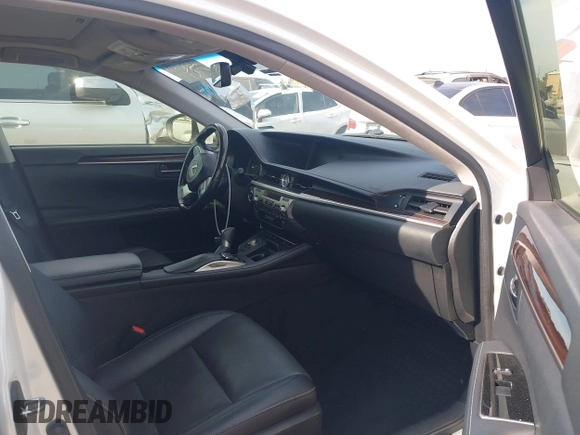 2016 Lexus ES 300h with VIN JTHBW1GGXG2113791, listed as a IAAI auction lot 41116740 with 188,974 mi miles and . Bid and sale history available at DreamBid. Image 5.