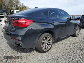 2016 BMW X6 xDrive50i with VIN 5UXKU6C50G0R33915, listed as a Copart auction lot 42183104 with 121,075 mi miles. Bid and sale history available at carsss.com. Image 3.