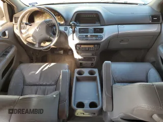 2009 Honda Odyssey EX-L with VIN 5FNRL38799B034292, listed as a Copart auction lot 52547205 with 116,658 mi miles and Salvage Title. Bid and sale history available at DreamBid. Image 8.