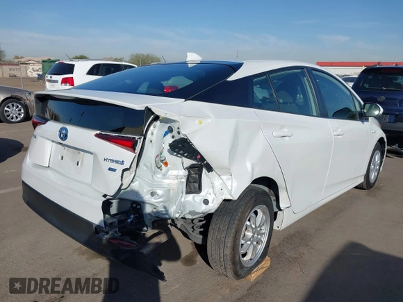 2021 Toyota Prius L Eco with VIN JTDKAMFU7M3133544, listed as a IAAI auction lot 41548653 with 115,214 mi miles and . Bid and sale history available at DreamBid. Image 6.