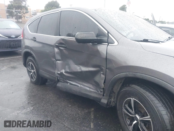 2014 Honda CR-V LX with VIN 2HKRM3H37EH515650, listed as a IAAI auction lot 41565999 with 139,425 mi miles. Bid and sale history available at carsss.com. Image 6.