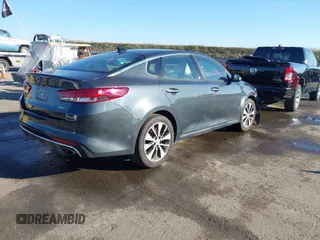 2016 Kia Optima SXL Turbo with VIN 5XXGV4L2XGG051938, listed as a IAAI auction lot 41400484 with 114,722 mi miles. Bid and sale history available at carsss.com. Image 4.
