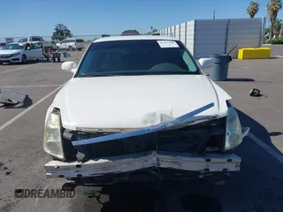 2007 Cadillac DTS Luxury I z VIN 1G6KD57Y77U133267, wystawiony jako IAAI lot #42337188 z przebiegiem 126 063 mil mil oraz . Historia ofert i sprzedaży dostępna na DreamBid. Obrazek 13.
