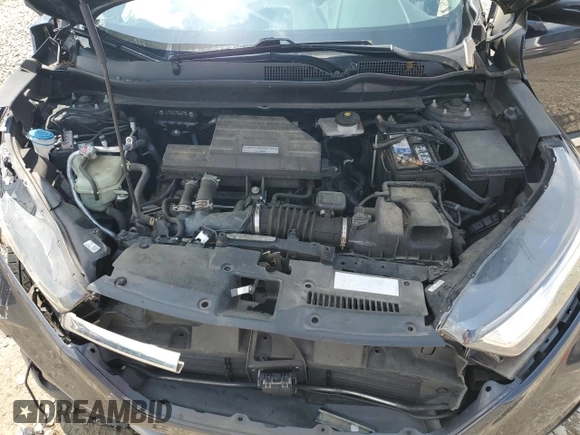 2018 Honda CR-V Touring with VIN 2HKRW2H9XJH605264, listed as a Copart auction lot 61500315 with 106,616 mi miles and Salvage title. Bid and sale history available at DreamBid. Image 12.