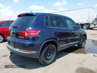 2013 Volkswagen Tiguan with VIN WVGCV3AX6DW605876, listed as a IAAI auction lot 42431619 with 106,279 mi miles and . Bid and sale history available at DreamBid. Image 4.