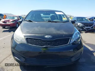2014 Kia Rio LX with VIN KNADM4A39E6364490, listed as a IAAI auction lot 42128702 with 130,981 mi miles and . Bid and sale history available at DreamBid. Image 13.