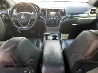2015 Jeep Grand Cherokee Overland with VIN 1C4RJFCT4FC813510, listed as a Copart auction lot 41466395 with 135,124 mi miles and Salvage Title. Bid and sale history available at carsss.com. Image 8.
