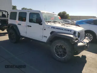 2023 Jeep Wrangler Rubicon 20th Anniversary with VIN 1C4JJXR63PW538877, listed as a Copart auction lot 57635015 with 25,924 mi miles and Salvage title. Bid and sale history available at DreamBid. Image 4.