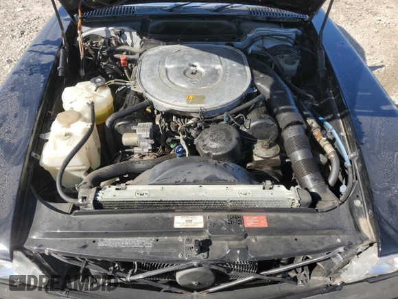 1986 Mercedes-Benz 560 SL z VIN WDBBA48D9GA049186, wystawiony jako Copart lot #76962434 z przebiegiem 93 967 mil mil oraz Nie do naprawy. Historia ofert i sprzedaży dostępna na DreamBid. Obrazek 11.