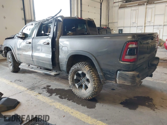 2020 Ram 1500 Rebel with VIN 1C6SRFLT0LN162491, listed as a IAAI auction lot 41841159 with 58,265 mi miles and . Bid and sale history available at DreamBid. Image 3.