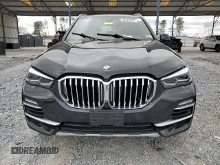 2019 BMW X5 xDrive40i with VIN 5UXCR6C51KLK86938, listed as a Copart auction lot 49463825 with 133,001 mi miles and Clean Title. Bid and sale history available at carsss.com. Image 5.