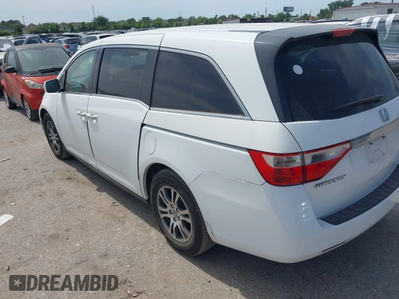 2013 Honda Odyssey EX z VIN 5FNRL5H44DB024764, wystawiony jako IAAI lot #42256598 z przebiegiem 169 708 mil mil oraz . Historia ofert i sprzedaży dostępna na DreamBid. Obrazek 3.