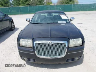 2006 Chrysler 300 Touring with VIN 2C3LA53G66H329729, listed as a IAAI auction lot 41946723 with 134,465 mi miles. Bid and sale history available at carsss.com. Image 6.